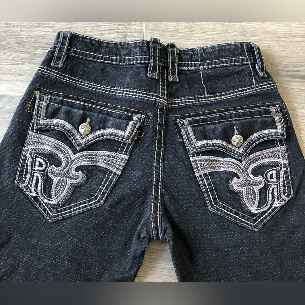 Rock Revival Black Denim with Bold Orange Accents